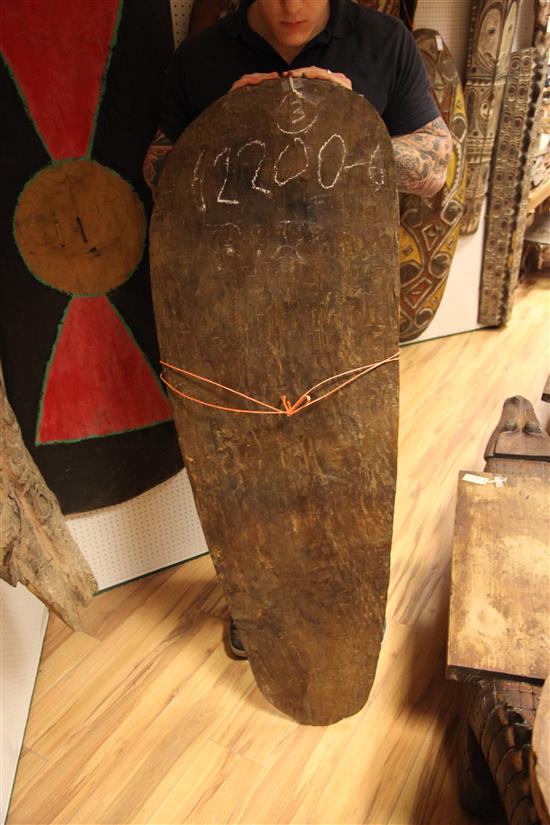 A Sepik River wooden ancestor spirit board and two other boards